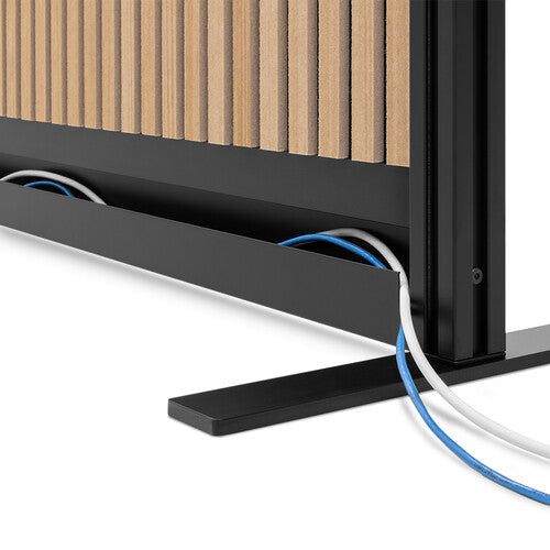 Black metal frame with wooden slats and cables hidden within, on a white background